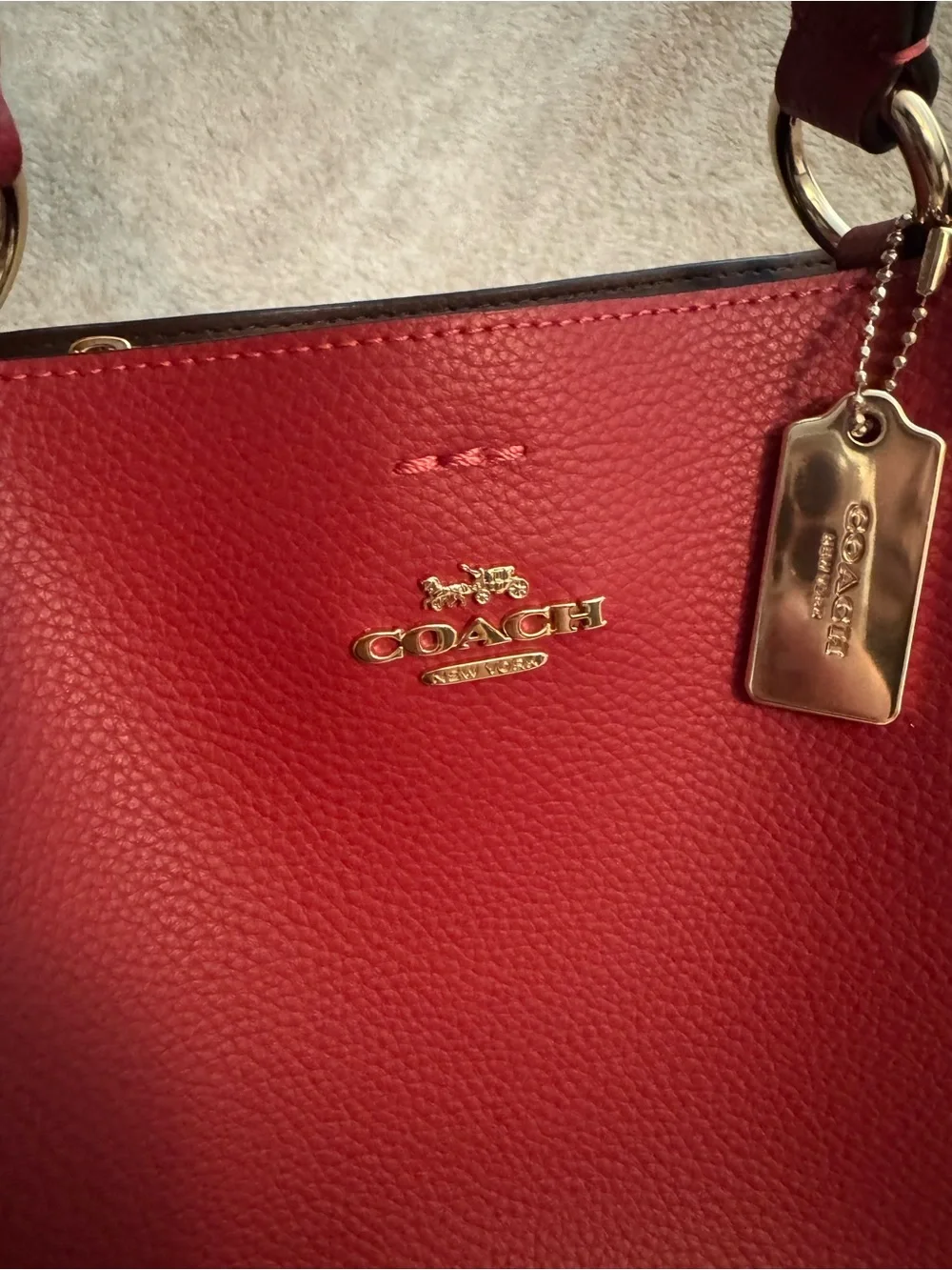 Coach Red Pebbled Leather Shoulder Tote with Gold Hardware Strap not included.